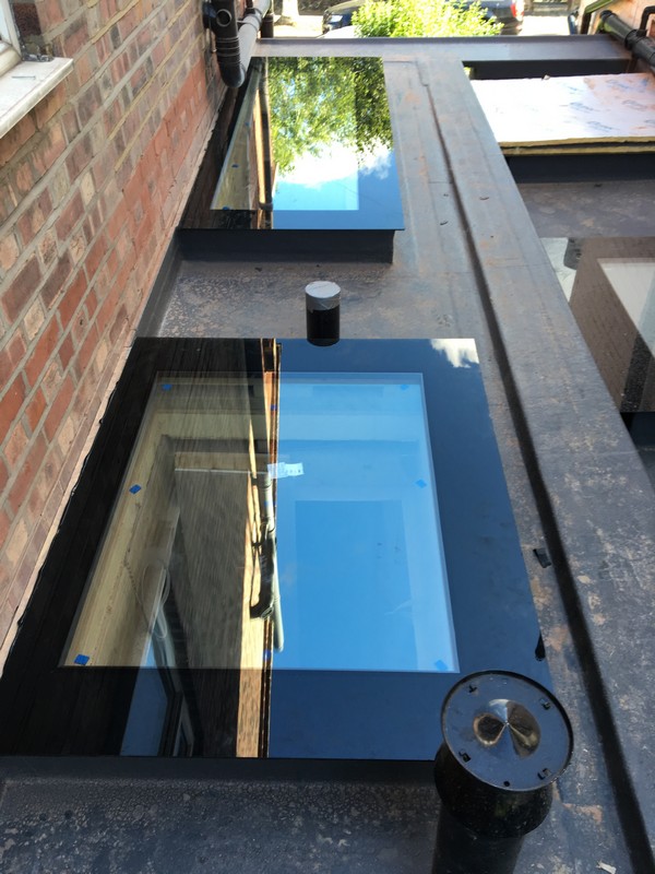 Multiple flat roof skylights on extension in Newport Pagnell
